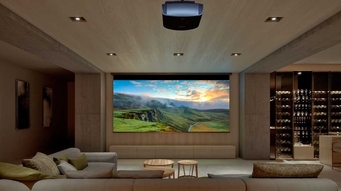 sony projector projecting an image of a field on a large screen