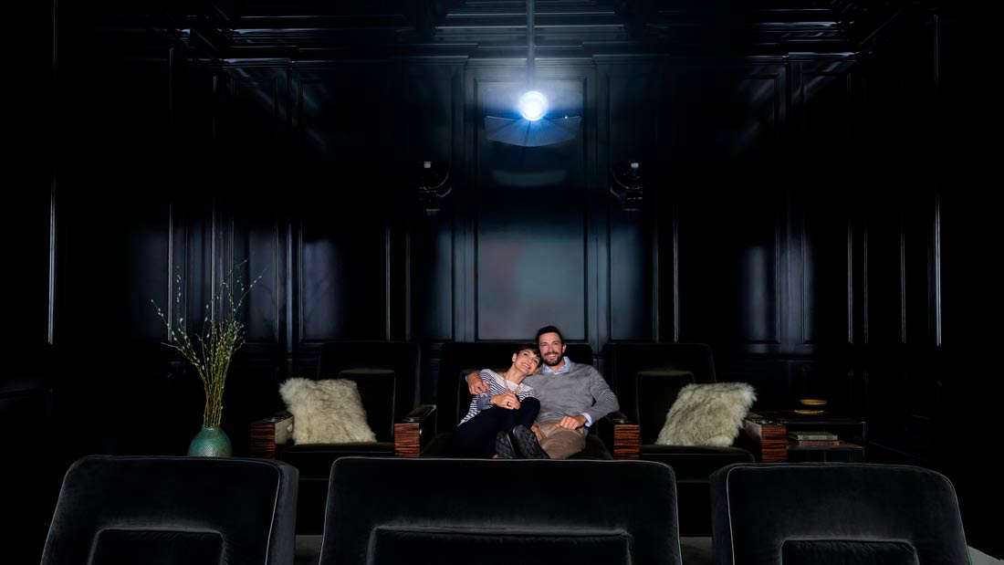 Couple seating on a custom home theater