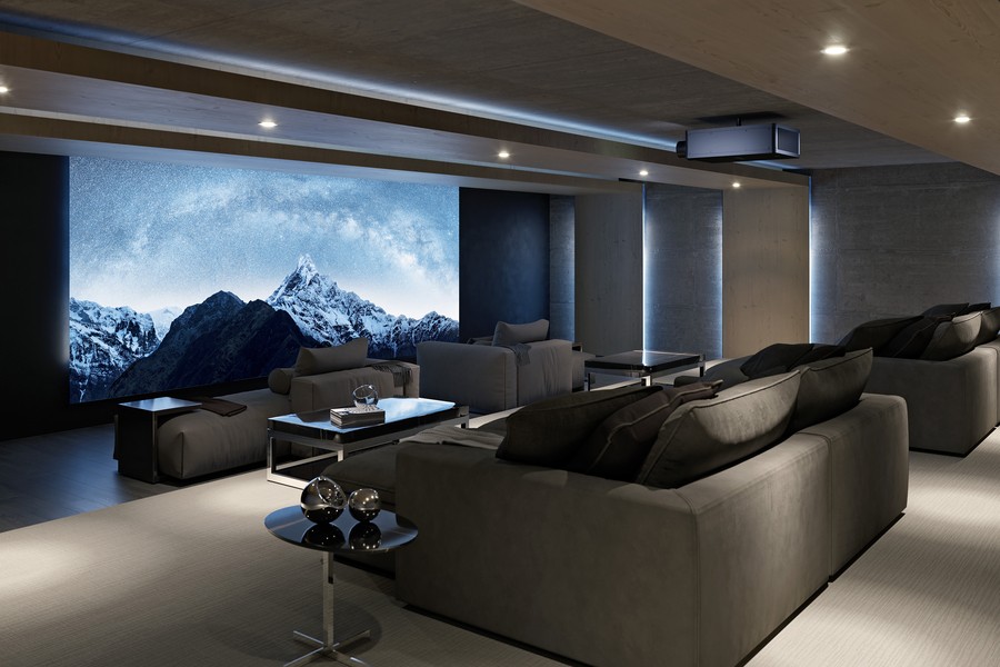 A home theater featuring a Sony ES ceiling projector and projector screen. 