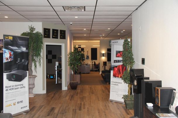 Showroom entrance with Sony banners and audio equipment displays